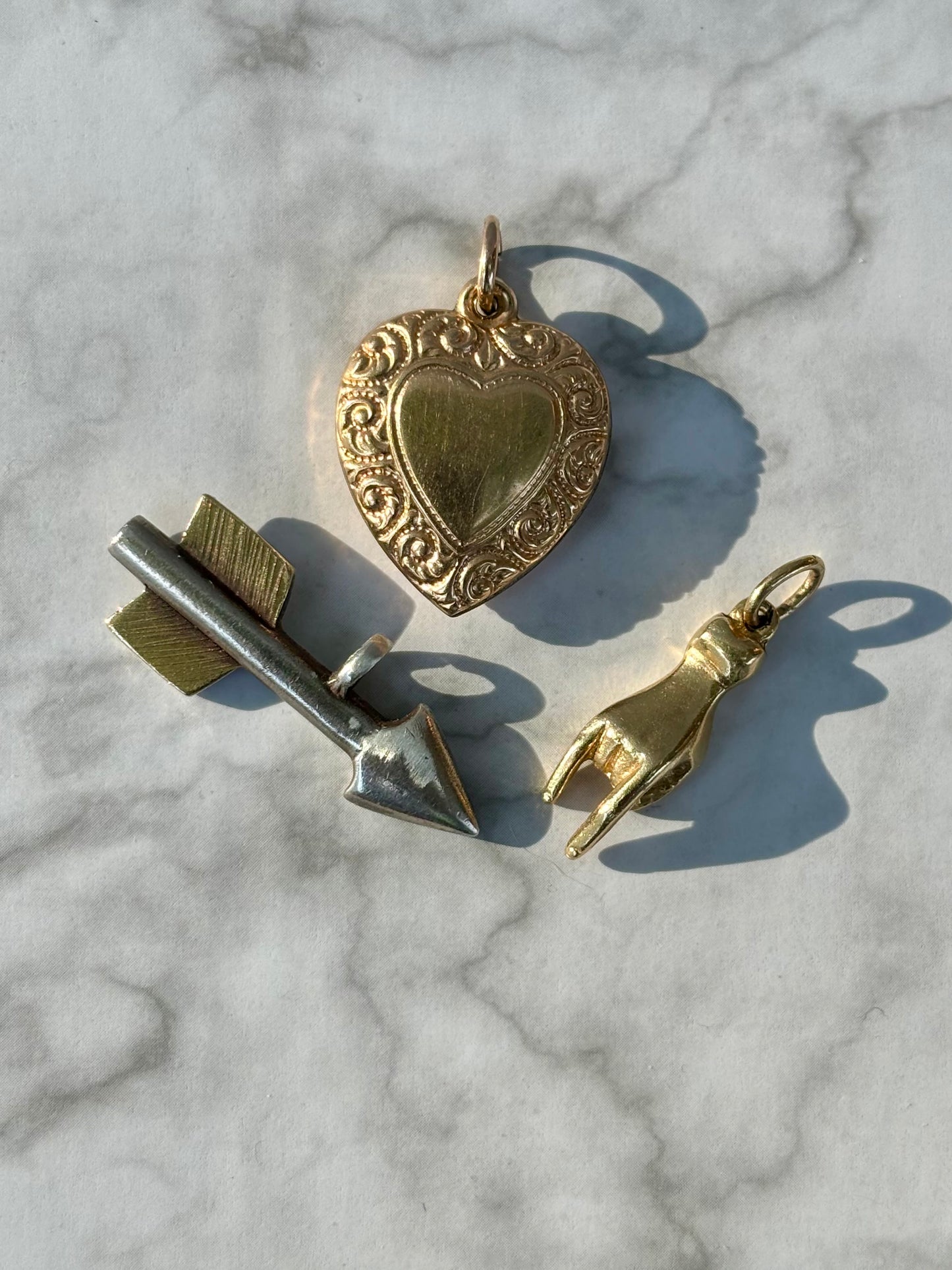 Mano Cornuto Charm