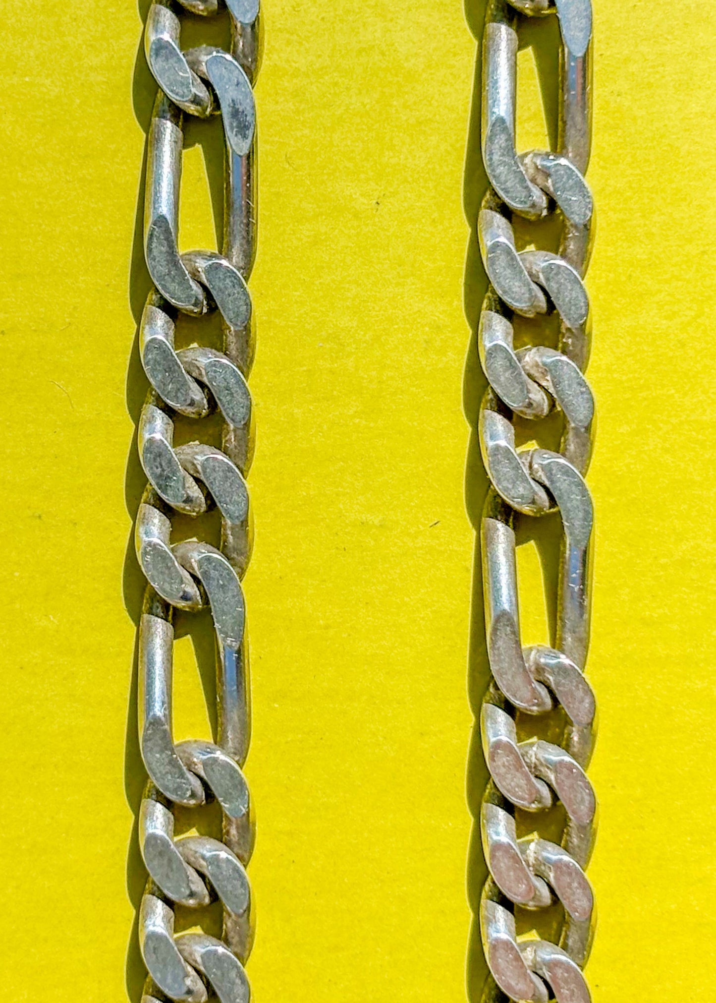 detail of vintage sterling Figaro chain