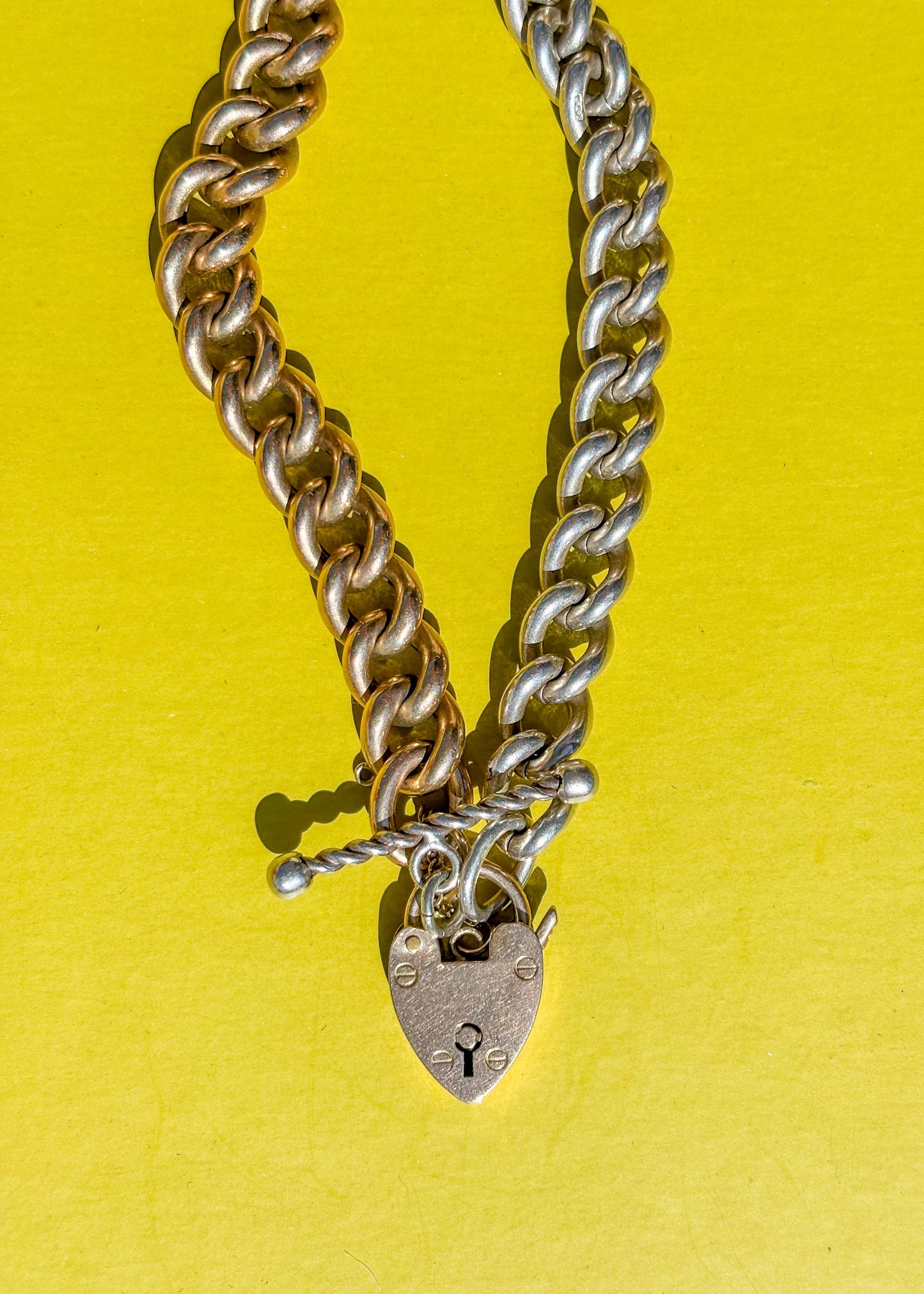 Vintage rose gold and silver chain with a padlock 