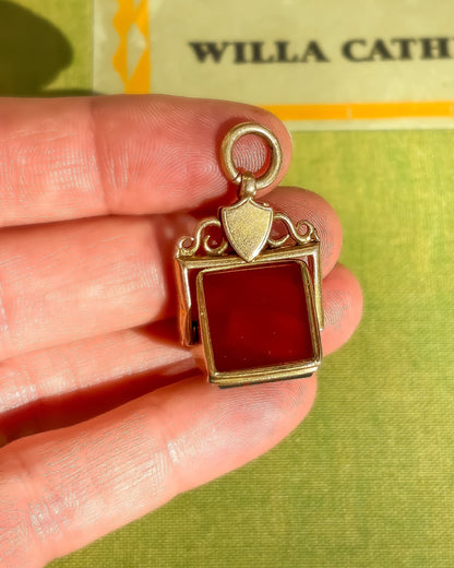 9K yellow gold fob pendant with carnelian stone.