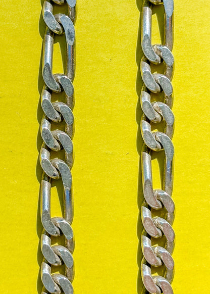 detail of vintage sterling Figaro chain