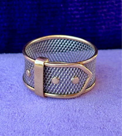 Vintage platinum ring with 18K yellow gold details and a buckle motif