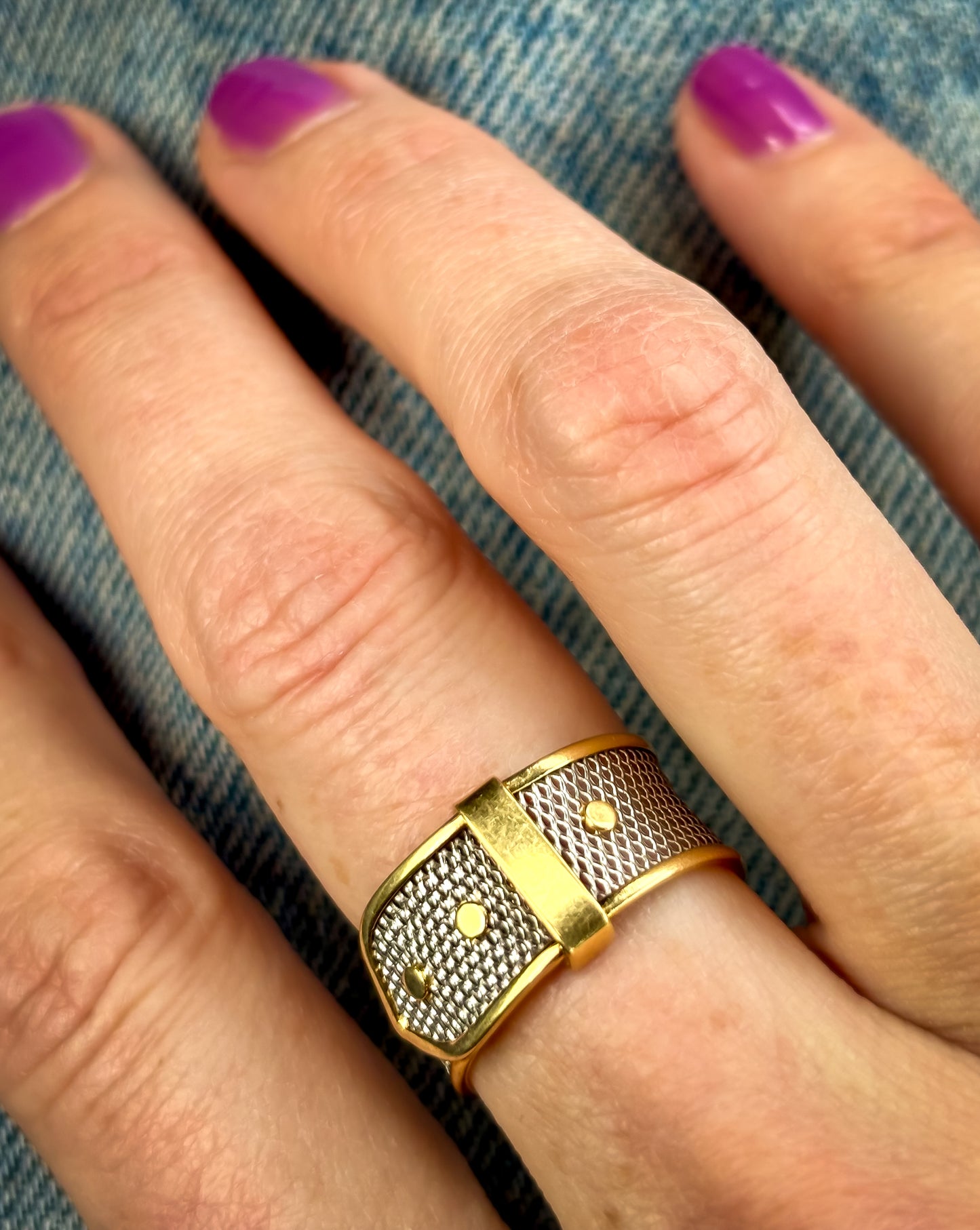 Vintage platinum buckle ring with 18K yellow gold details